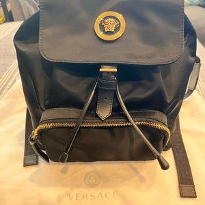 Brand NEW beautiful Versace Nylon backpack with gold emblem and signature straps